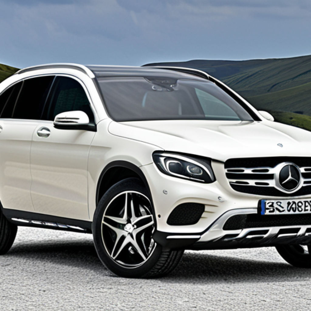 **Image:** Luxurious Mercedes-Benz GLC, showcasing its elegant design, curved lines, prominent grille with the three-pointed star, and sporty alloy wheels. Capture the feeling of prestige and sophistication.